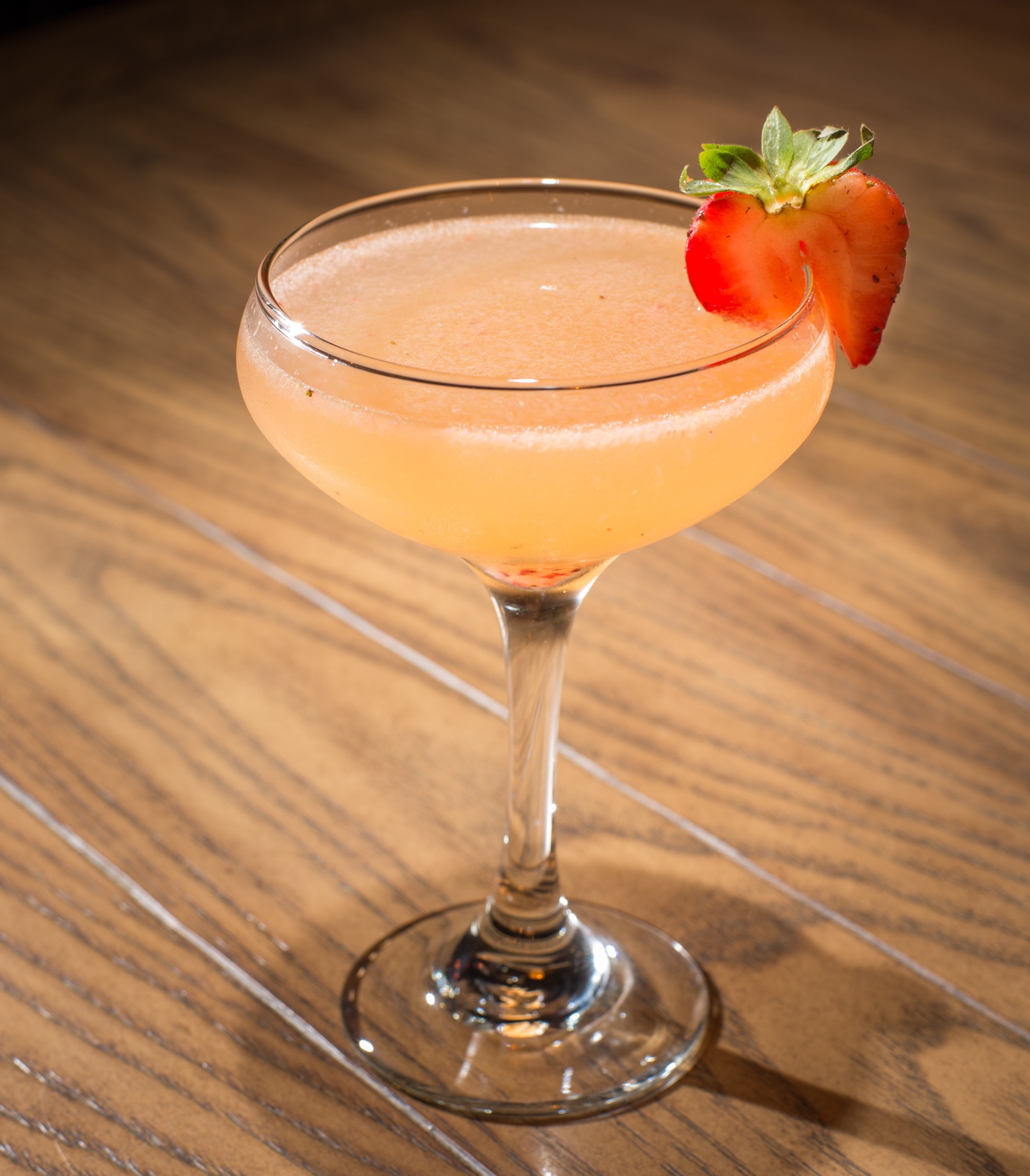 The Jezebel 75' is a delicious champagne-infused cocktail mixed with strawberries and fresh orange juice, and spiked with vodka for an extra kick! 
