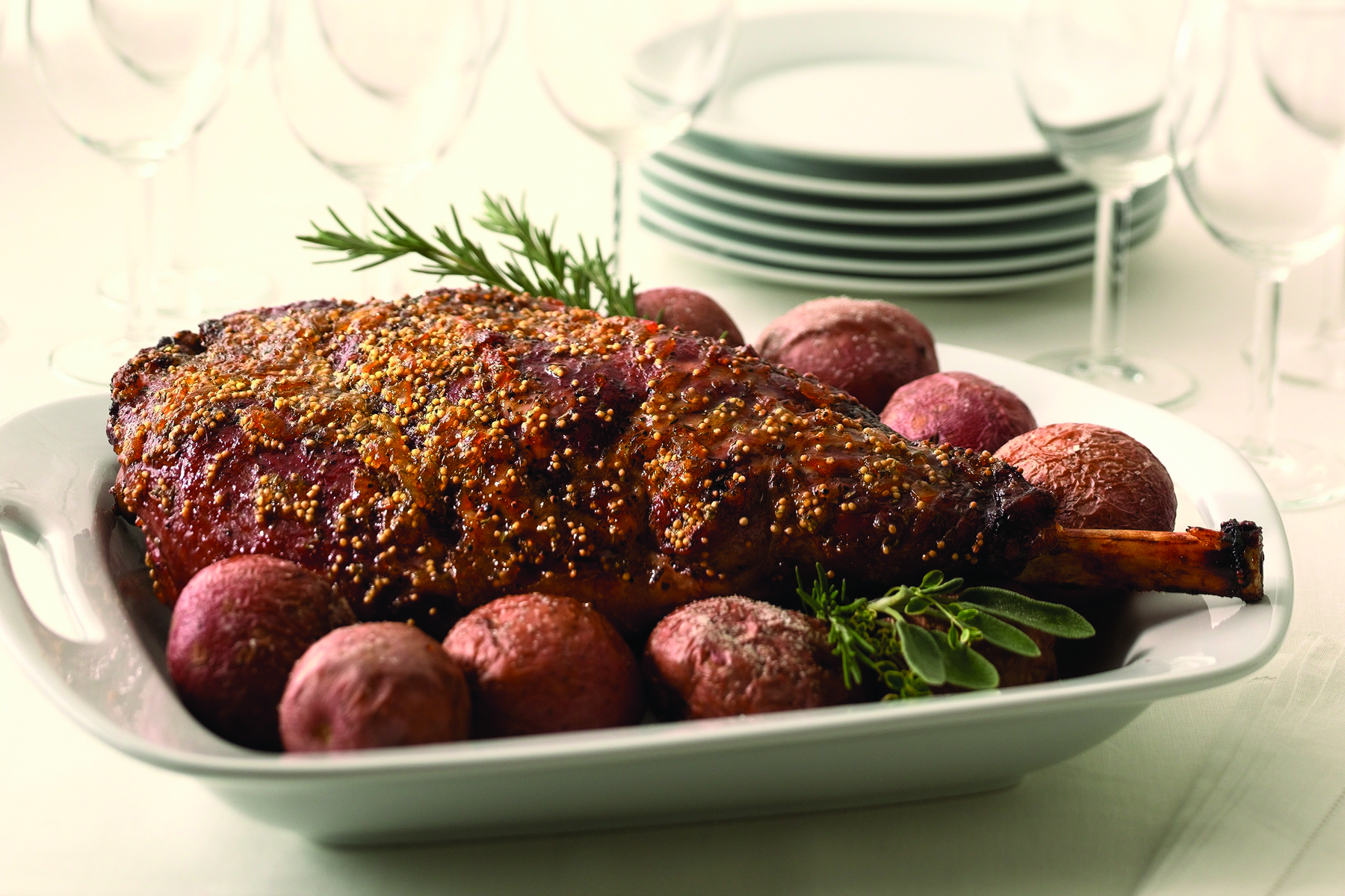 Nothing says love like a gorgeous and delicious meal, especially one made with Leg of Lamb and crisp and creamy roasted red potatoes. Gather your family around the table and enjoy.