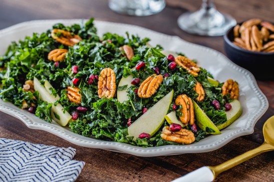 Combine crunchy kale with fresh pecans, pomegranate seeds and pears for a colorful and nutritious salad that’s topped with a simple homemade dressing.