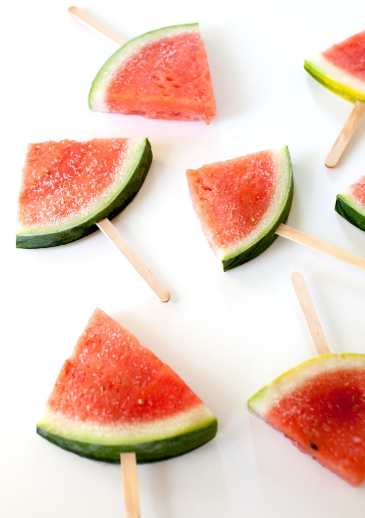 Soaked watermelon slice popsicles made with Sparkling Ice. 