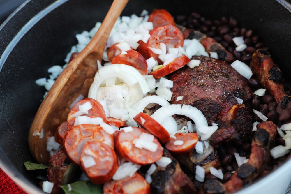 Feijoada is traditionally known as a stew with beef and pork, of Portuguese origin. Filled with a smoky, garlicky, flavor this Brazilian dish is a barbecued crowd-pleaser.
