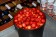 A basket filled with fresh picked cherries at White Cottage Red Door in Door County, Wisconsin.