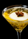 This autumn apple martini is made with apple flavored vodka, light apple juice, club soda, lime and garnished with apple slices.