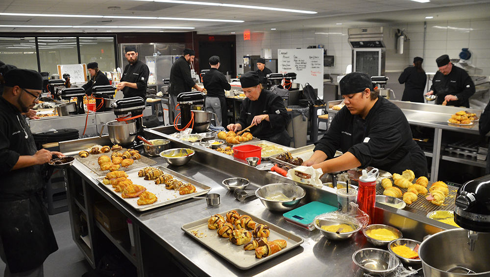 Students learning the art of pastry from instructor Vince Pianalto at Brightwater, A Center for the Study of Food. 