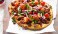 This recipe for Mediterranean Pizza with Grapes is a take on a classic pizza, made with naan. Filled with the protein of your choice browned and seasoned with tomato paste, olive oil, lemon juice, paprika and cayenne.