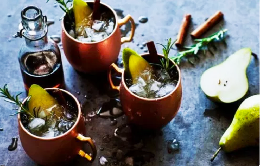 This pear-y twist on the classic Moscow Mule cocktail—with the warming effects of ginger and cinnamon, and the scent of fresh rosemary—is the perfect party starter.