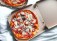 A box of takeout pizza is the reality for many couples on Valentine's Day.
