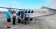 Tourists boarding a small plane as they prepare to tour the Hawaiian islands.