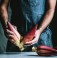 A chef shows readers how to prepare a banana blossom in The Wicked Healthy Cookbook, which extols the virtues and health benefits of a plant-based diet. 