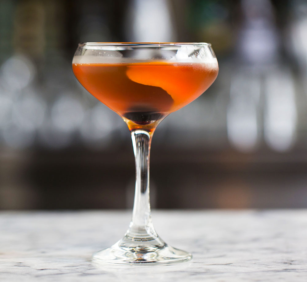 A Manhattan cocktail made with whiskey, vermouth and bitters. 