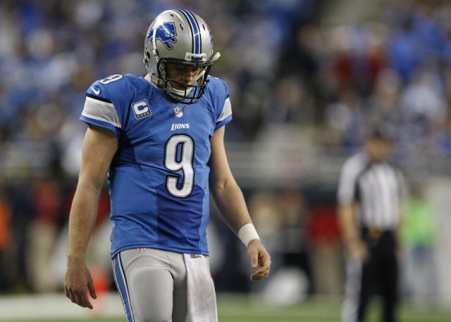 Detroit Lions quarterback Matthew Stafford looks down during an overtime game against the New York Giants at Ford Field. Giants beat the Lions 23-20. (Raj Mehta - USA TODAY Sports)