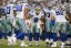Dallas Cowboys quarterback Tony Romo (9) calls the play in the huddle. (Matthew Emmons-USA TODAY Sports)
