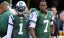 New York Jets quarterback Geno Smith (7) stands beside quarterback Michael Vick (1) after being benched in the first half against the Buffalo Bills. (Robert Deutsch-USA TODAY Sports)