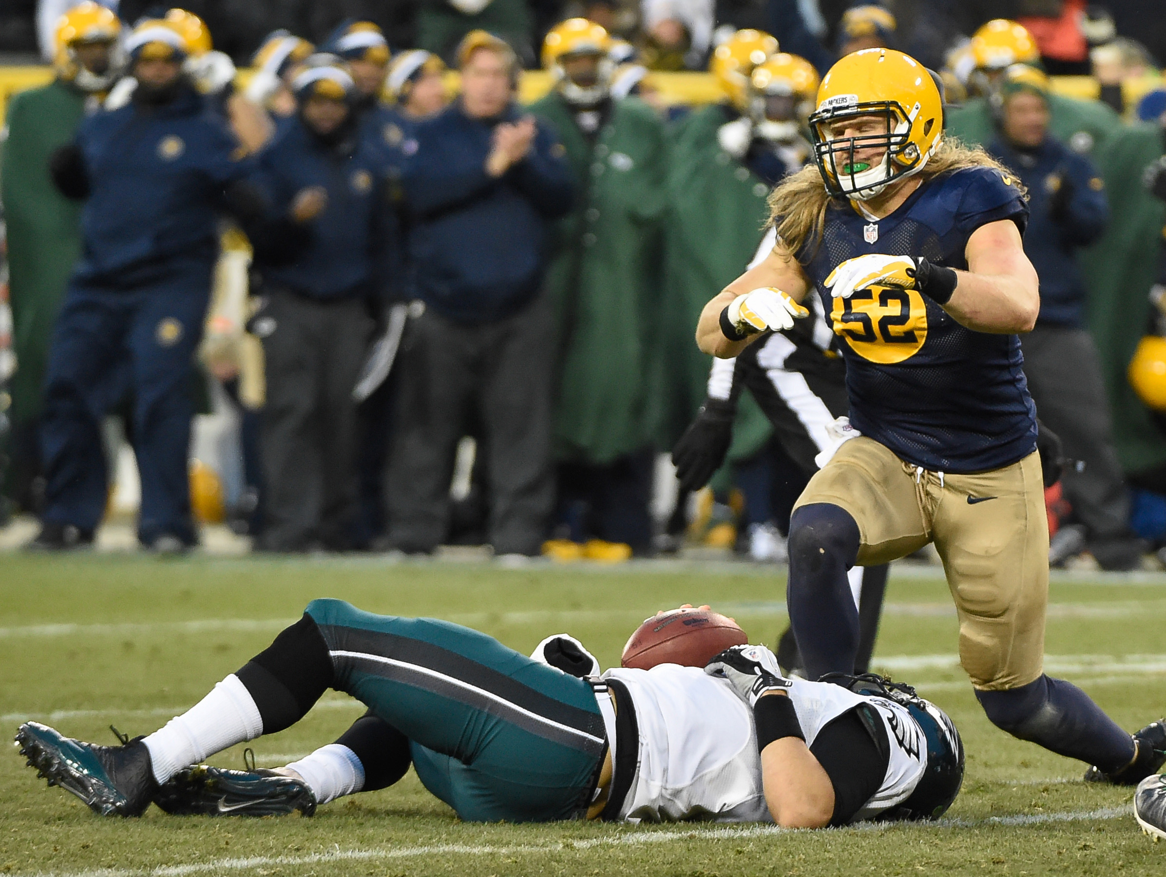 Green Bay Packers linebacker Clay Matthews (52) reacts after sacking Philadelphia Eagles quarterback Mark Sanchez (3) in the second quarter. (Benny Sieu, USA TODAY Sports)
