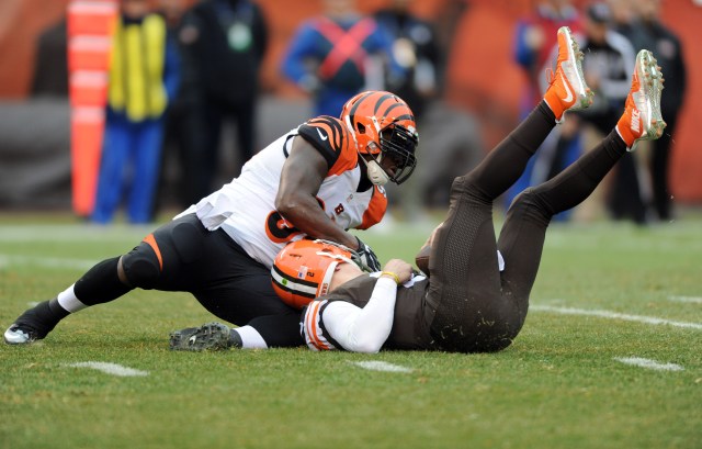 That's Johnny Manziel being thrown to the ground. It happened frequently Sunday. (Ken Blaze, USA TODAY Sports)