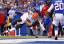 Cleveland Browns quarterback Johnny Manziel (2) scores a touchdown as Buffalo Bills outside linebacker Nigel Bradham. (Kevin Hoffman-USA TODAY Sports)