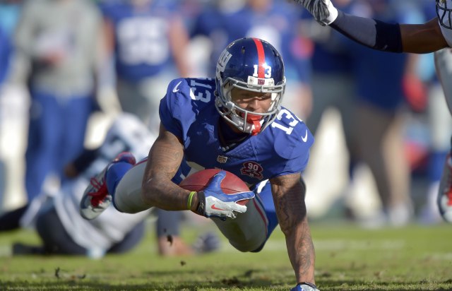 New York Giants wide receiver Odell Beckham Jr (13) carries the ball against the Tennessee Titans. (Don McPeak-USA TODAY Sports)