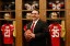 San Francisco 49ers head coach Jim Tomsula poses for a photo in the locker room after a press conference for his introduction as head coach at Levi's Stadium Auditorium. (Kelley L Cox-USA TODAY Sports)