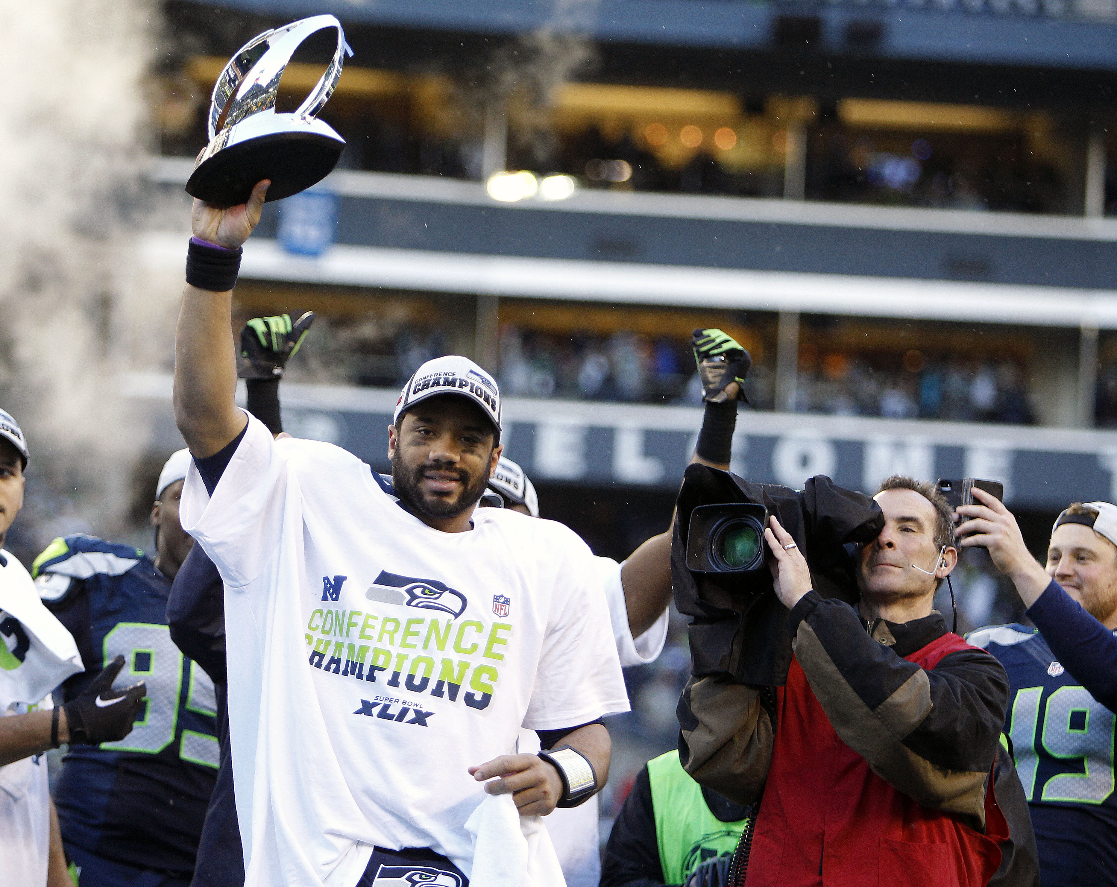Seattle QB Russell Wilson celebrates the win. He completed 14-of-29 passes for 209 yards and was intercepted four times ... and yet this is the signature game of his young career. He was that good in the final minutes. (Joe Nicholson, USA TODAY Sports)