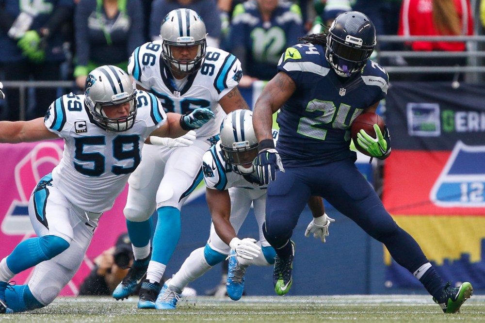 Seahawks RB Marshawn Lynch (24) is expected to return Sunday to be greeted by Panthers MLB Luke Kuechly (59). (Joe Nicholson, USA TODAY Sports)
