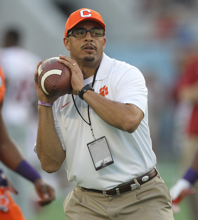 Tony Elliott instantly took to Chad Morris' offense when he became the Tigers' running backs coach in 2011.