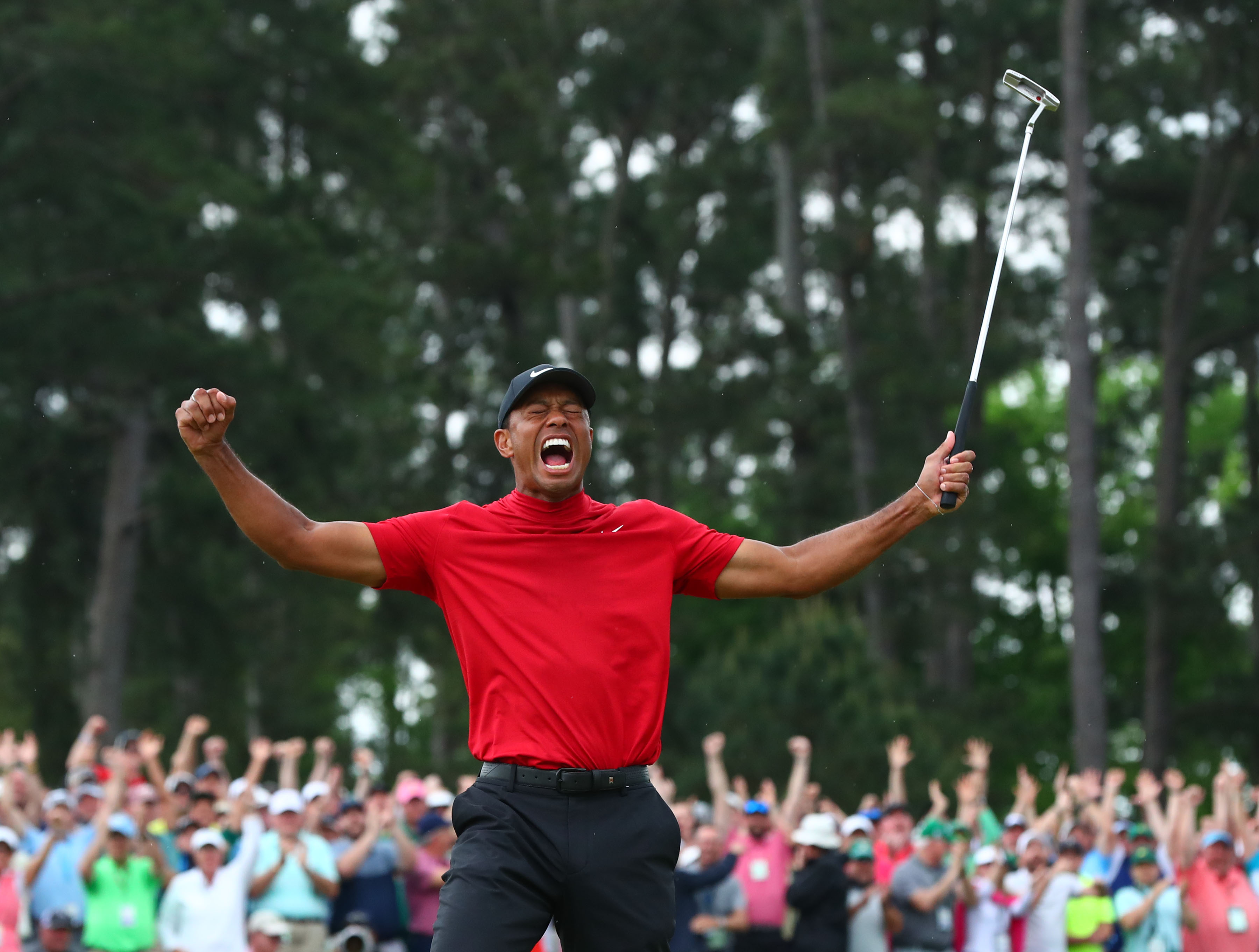 Tiger Woods’ Masters victory The story behind the iconic images at Augusta