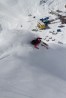 Austin Ross slashes a pow turn high above the famous yellow hotel