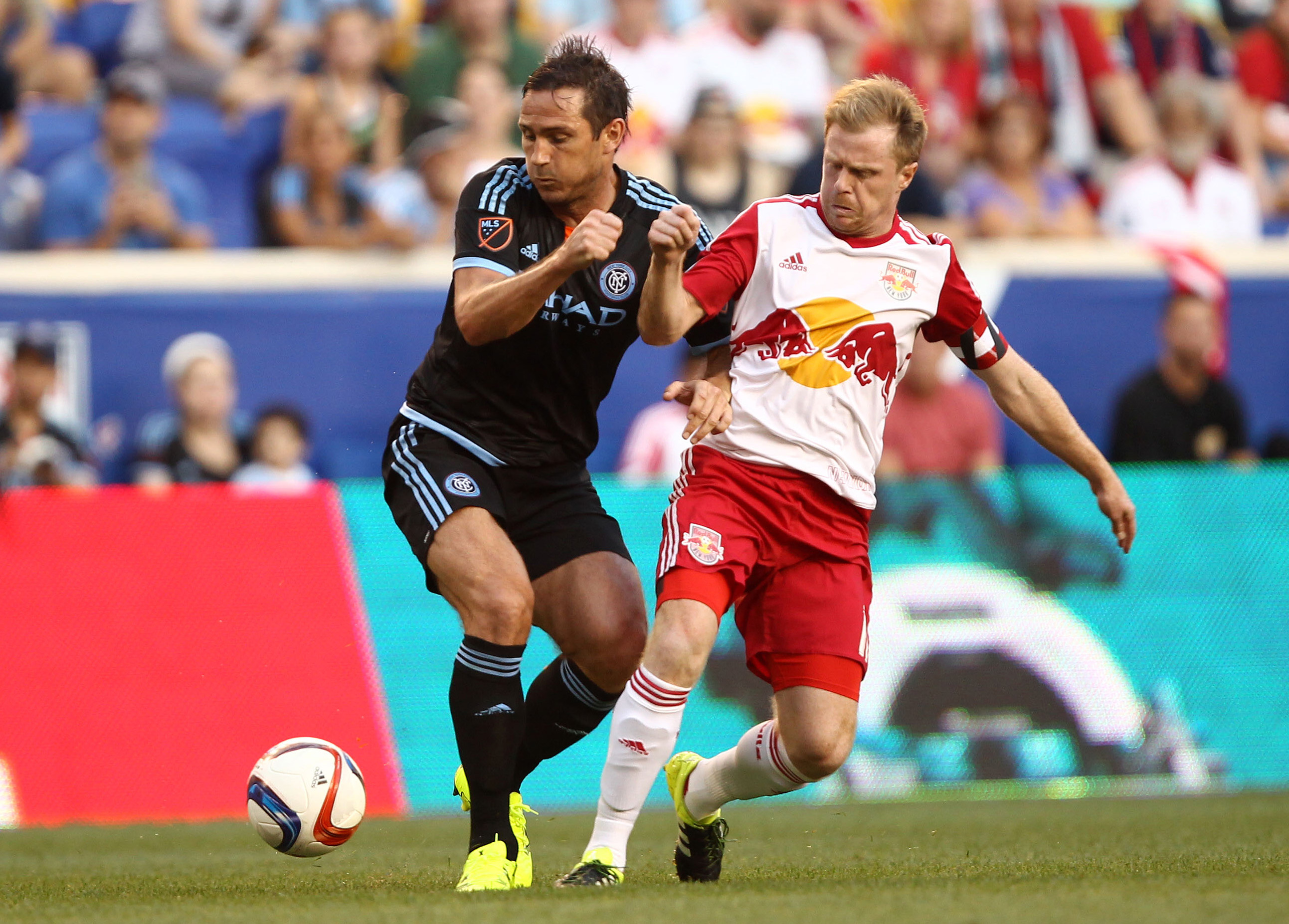 Aug 9, 2015; Harrison, NJ, USA; New York City FC midfielder Frank Lampard (8) and New York Red Bulls midfielder Dax McCarty (11) battle for a ball during the first half at Red Bull Arena. Mandatory Credit: Danny Wild-USA TODAY Sports