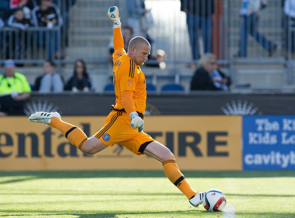 Apr 11, 2015; Philadelphia, PA, USA; New York City FC goalkeeper Josh Saunders (12) kicks the ball against the Philadelphia Union during the second half at PPL Park. The Union won 2-1. Mandatory Credit: Bill Streicher-USA TODAY Sports