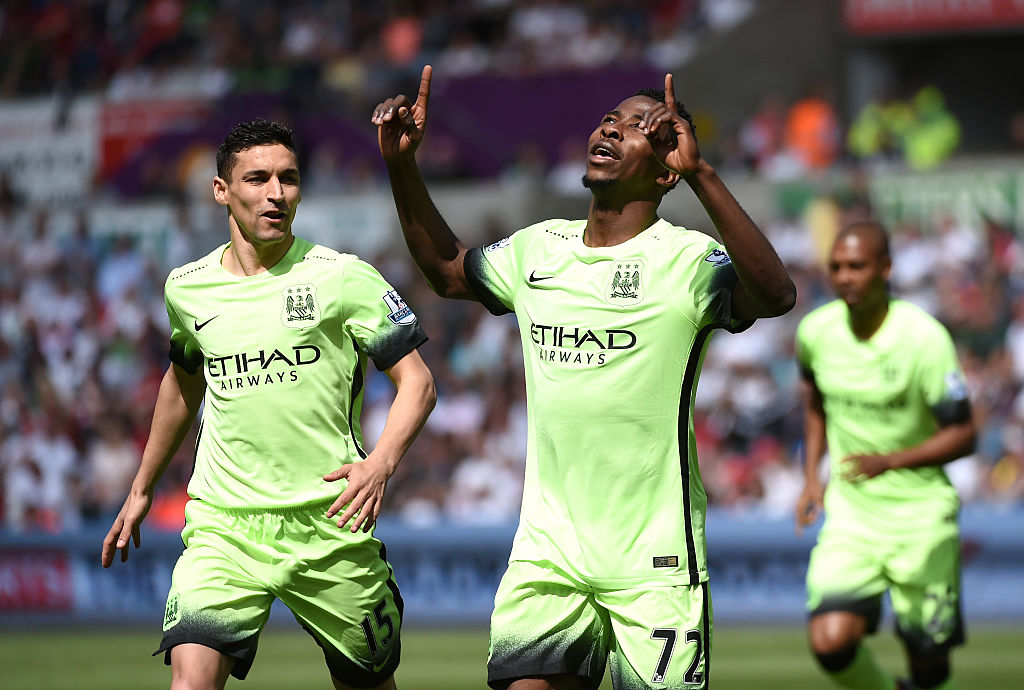 SWANSEA, WALES - MAY 15: Kelechi Iheanacho of Manchester City celebrates scoring his team's first goal during the Barclays Premier League match between Swansea City and Manchester City at the Liberty Stadium on May 15, 2016 in Swansea, Wales.