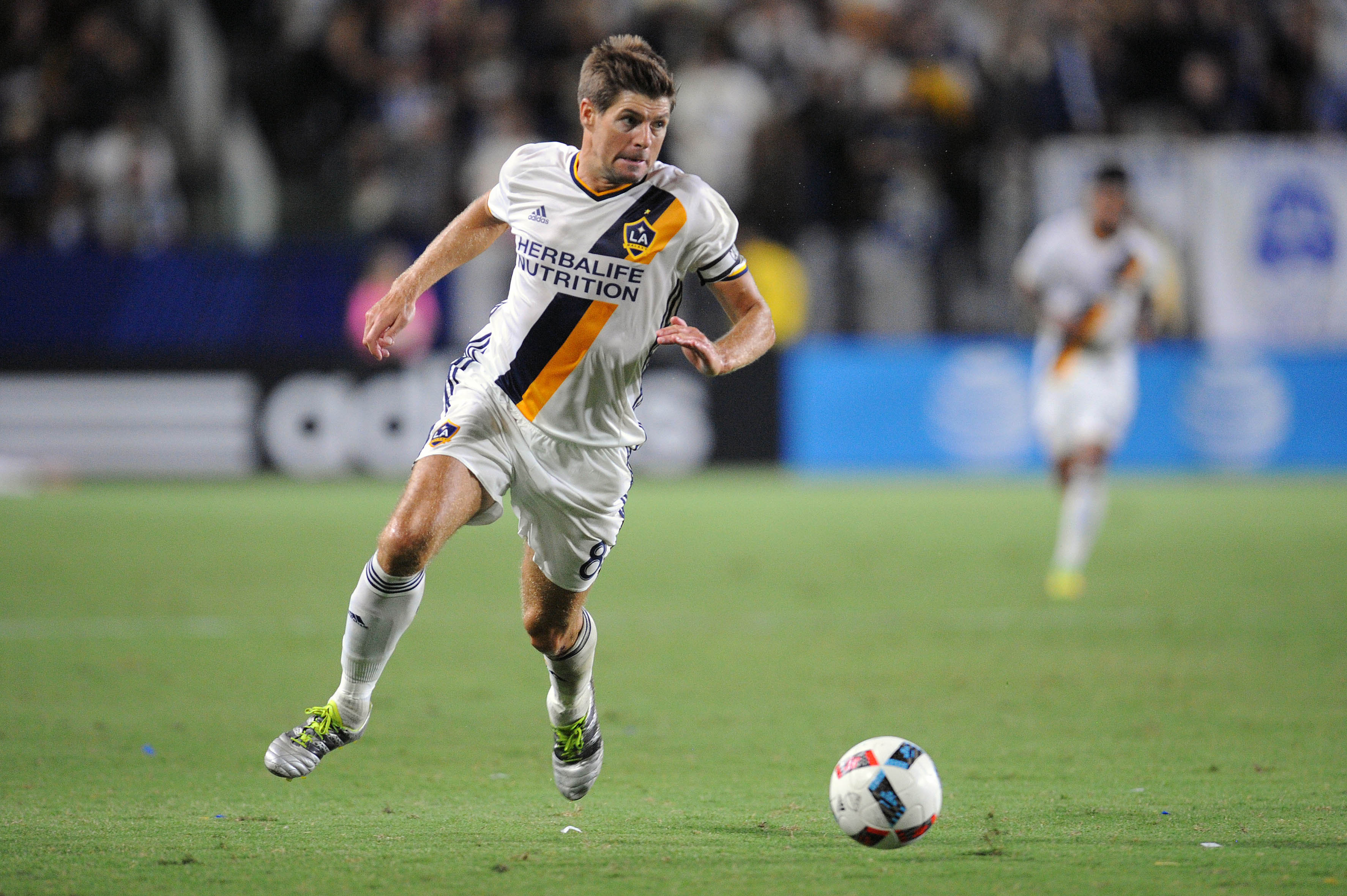 August 13, 2016; Carson, CA, USA; Los Angeles Galaxy midfielder Steven Gerrard (8) moves the ball up field against Colorado Rapids during the second half at StubHub Center. Mandatory Credit: Gary A. Vasquez-USA TODAY Sports