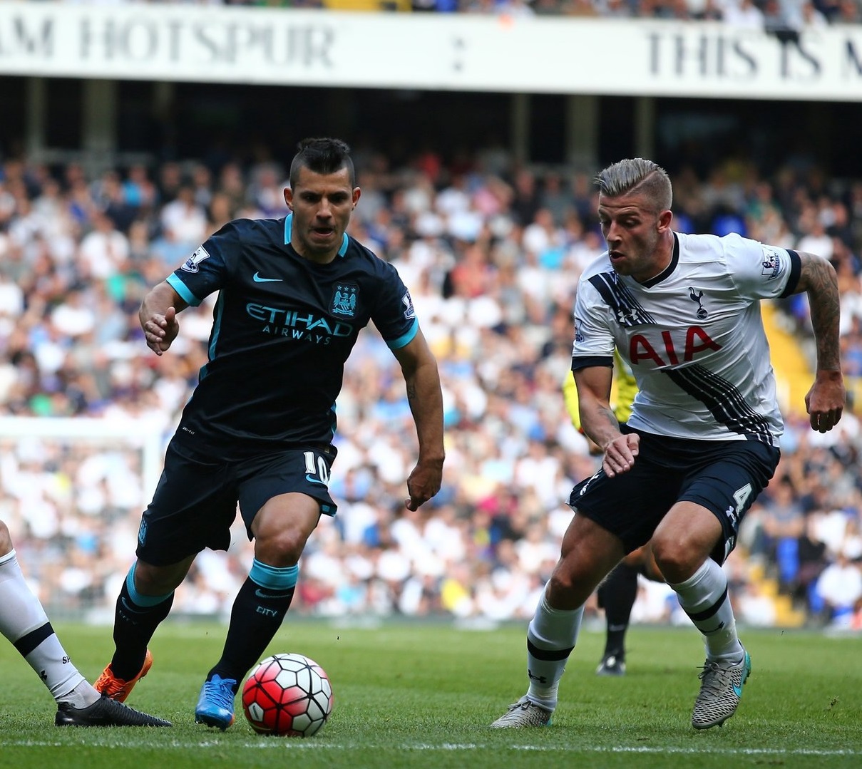 Manchester City's Argentinian striker Sergio Aguero (2nd R) vies with Tottenham Hotspur's Belgian defender Toby Alderweireld (R) and Tottenham Hotspur's English defender Eric Dier (L) the English Premier League football match between Tottenham Hotspur and Manchester City at White Hart Lane in north London on September 26, 2015. AFP PHOTO / JUSTIN TALLIS RESTRICTED TO EDITORIAL USE. No use with unauthorized audio, video, data, fixture lists, club/league logos or 'live' services. Online in-match use limited to 75 images, no video emulation. No use in betting, games or single club/league/player publications. (Photo credit should read JUSTIN TALLIS/AFP/Getty Images)