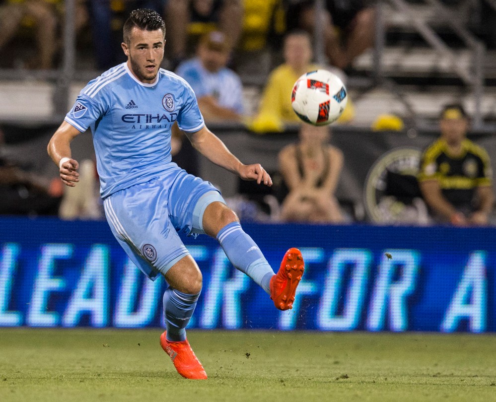 Aug 13, 2016; Columbus, OH, USA; New York City FC midfielder Jack Harrison (11) sends a crossing pass against Columbus Crew SC at MAPFRE Stadium. The game ended in a 3-3 tie. Mandatory Credit: Greg Bartram-USA TODAY Sports