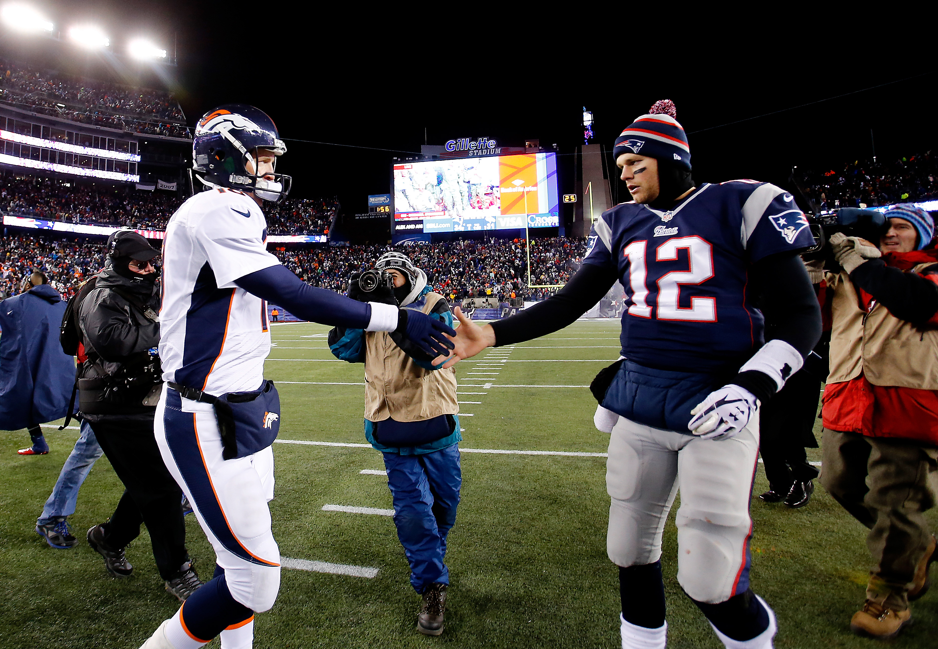 Peyton Manning with the AFC Championship Trophy 2013 AFC Championship Game  Sports Photo - Item # VARPFSAAQP047 