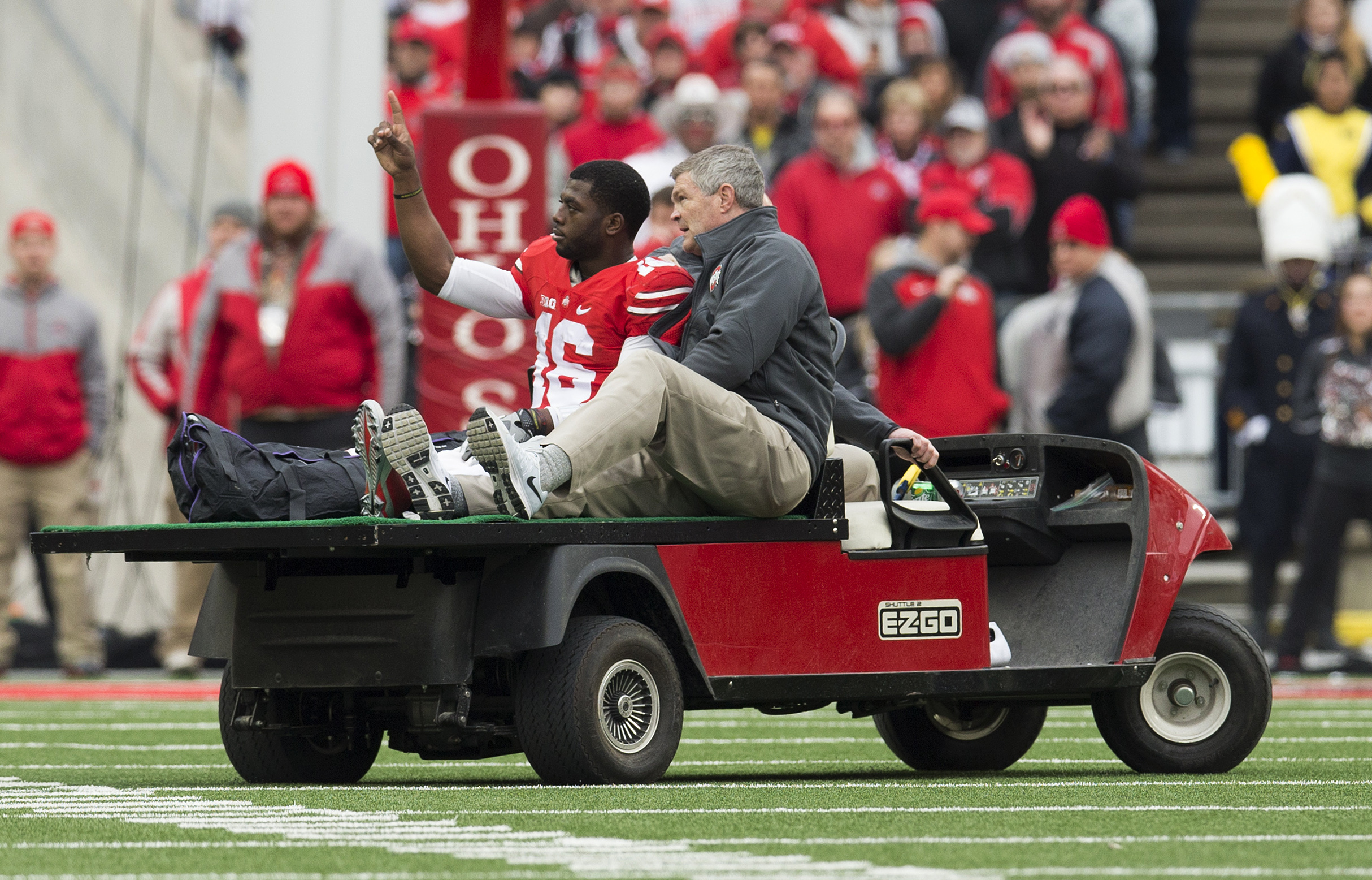 J.T. Barrett injury: Ohio State QB suffers right ankle fracture, carted off  against Michigan - Sports Illustrated