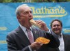 A wealthy man eats a hot dog in Brooklyn. (Mario Tama/Getty Images)