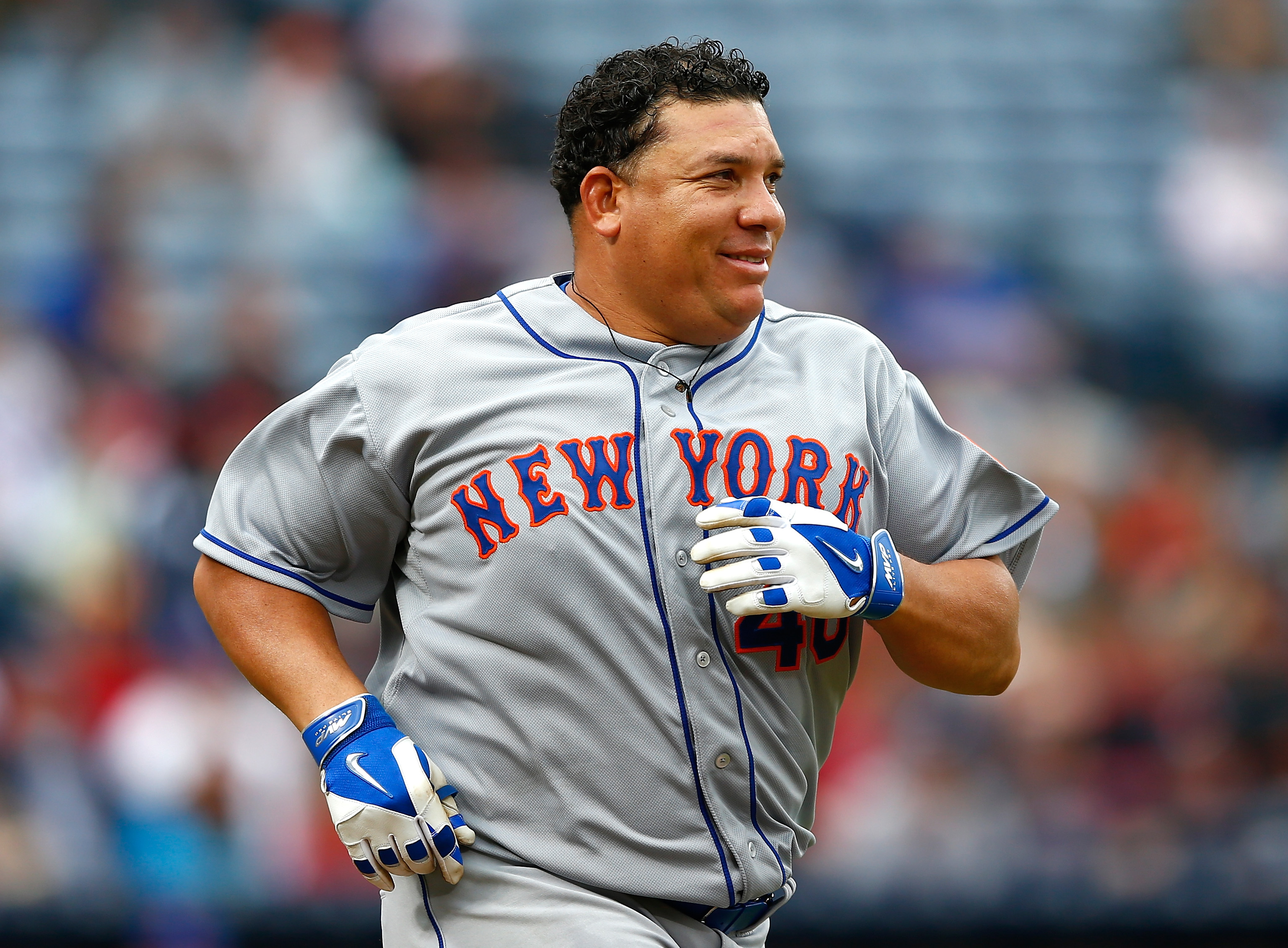 Bartolo Colon lost his helmet while driving in a run and couldn't have  looked happier