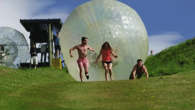 Watch a real-life Indiana Jones get crushed by a giant inflatable boulder