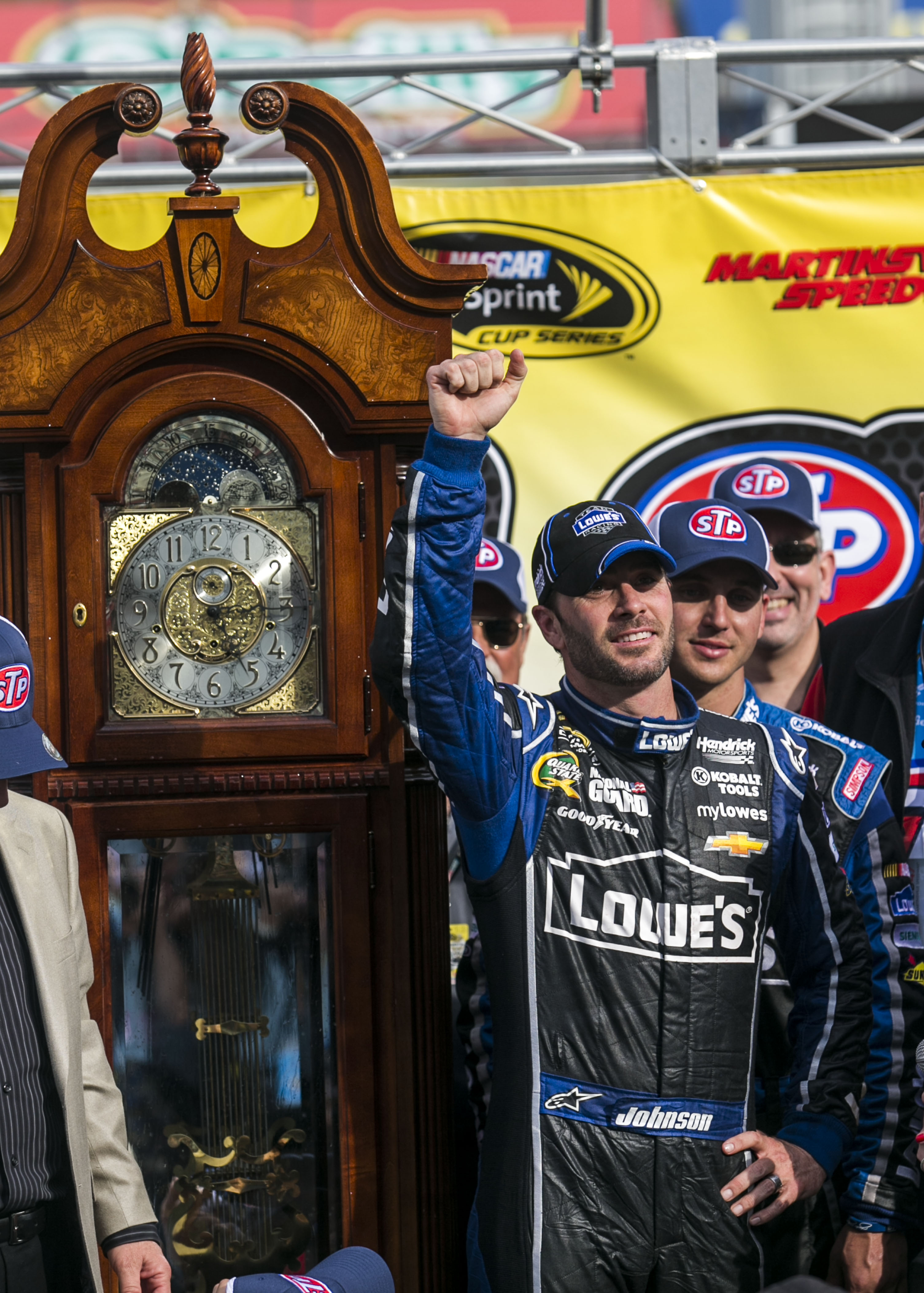 Apr 7, 2013; Martinsville, VA, USA; NASCAR Sprint Cup Series driver Jimmie Johnson (48) celebrates winning the STP Gas Booster 500 at Martinsville Speedway. Mandatory Credit: Peter Casey-USA TODAY Sports ORG XMIT: USATSI-128780 ORIG FILE ID: 20130407_pjc_bc1_181.jpg