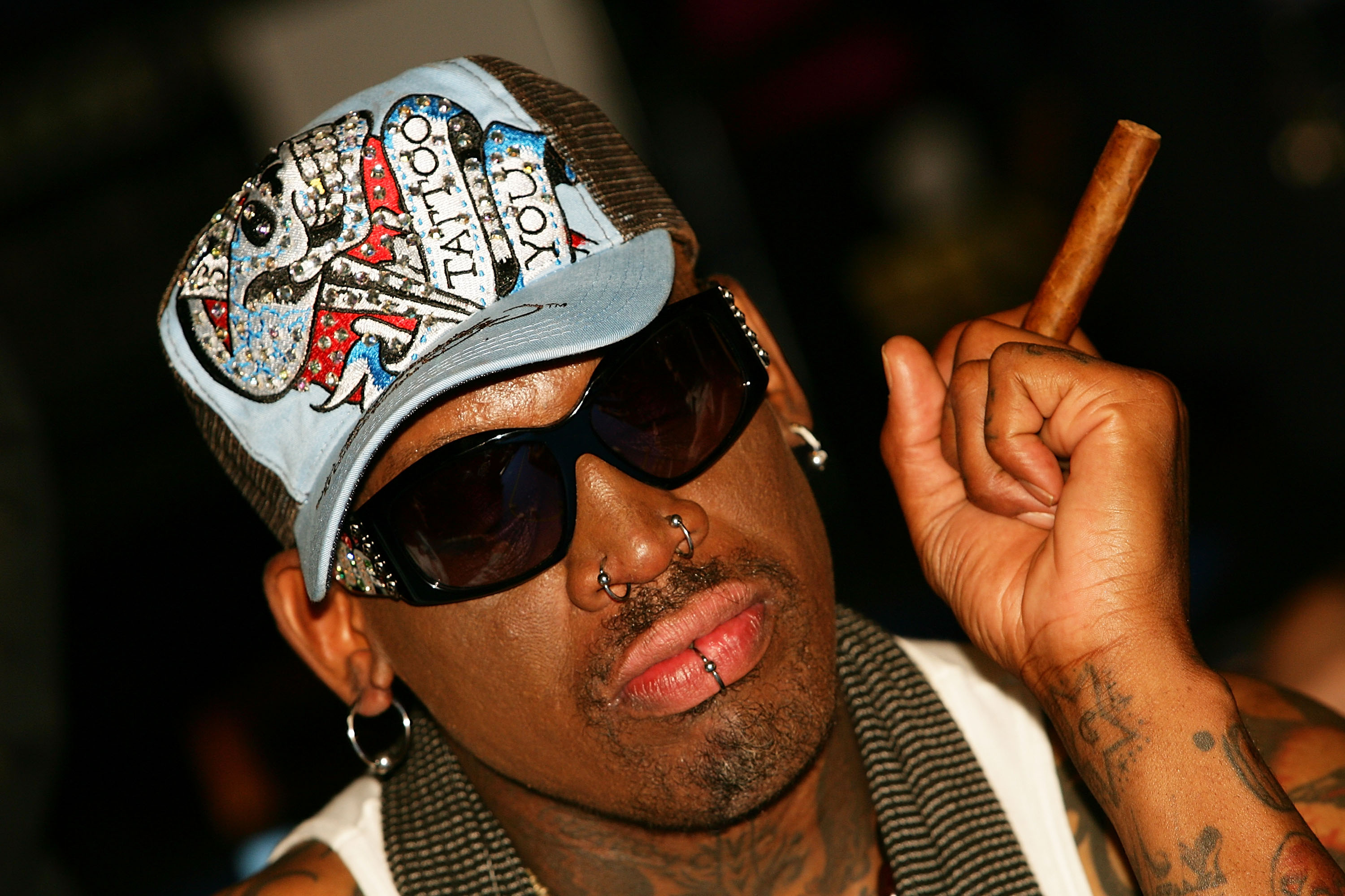 Gosh! See the tattoo Dennis Rodman has on his back ▷ Waploaded