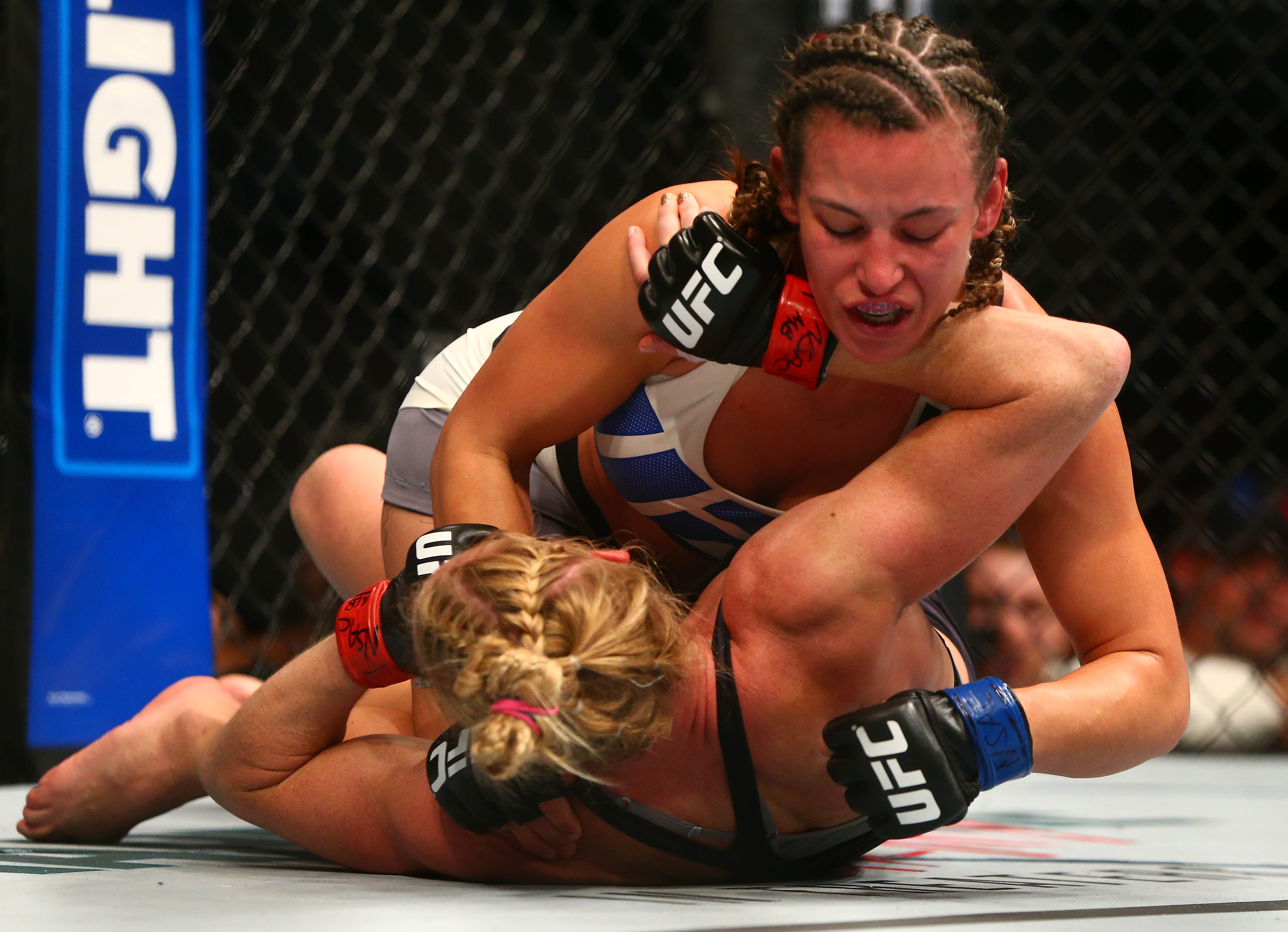 10 Top Photos From Miesha Tate’s 5 Round Submission Victory Vs Holly Holm For The Win