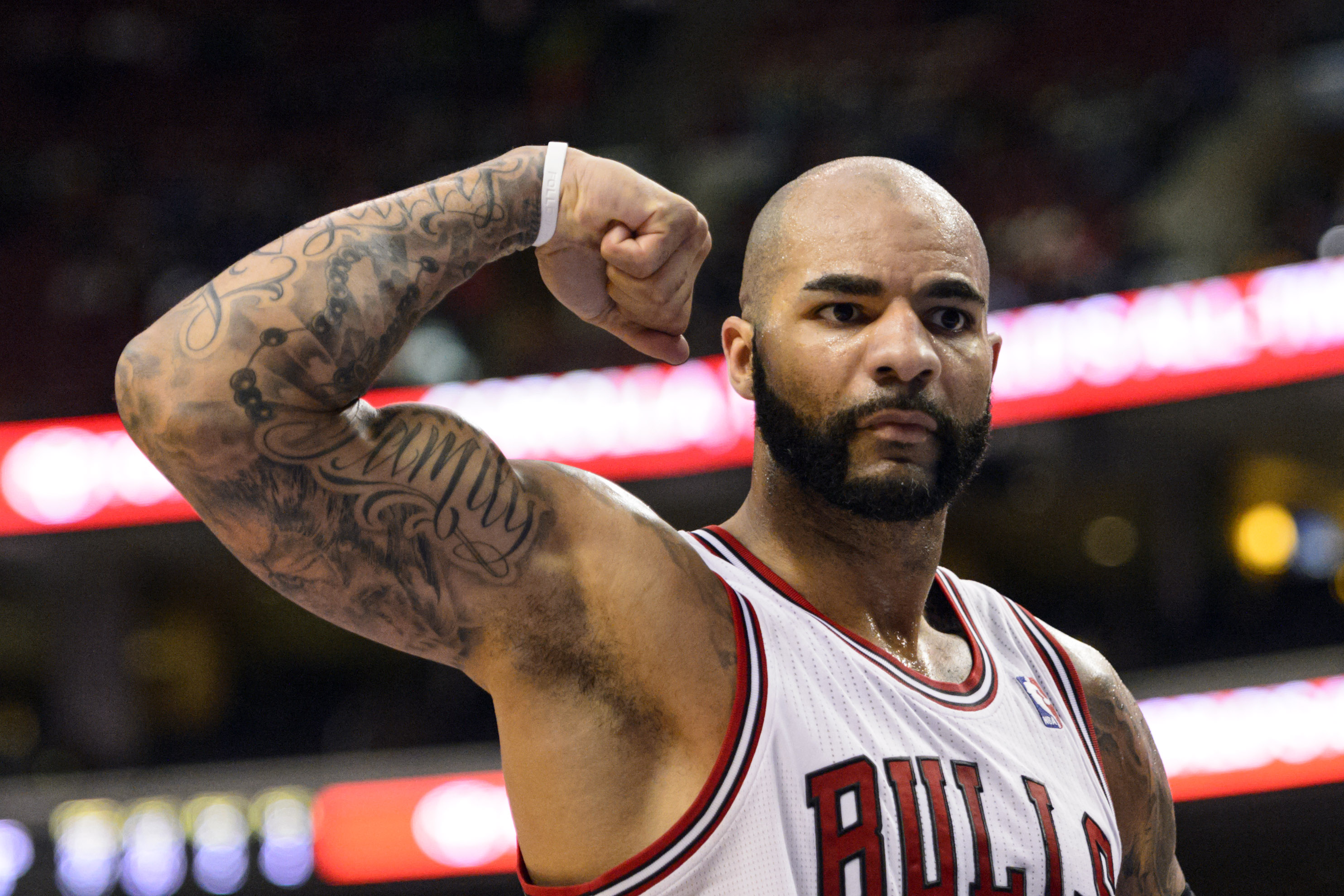 Nov 2, 2013; Philadelphia, PA, USA; Chicago Bulls forward Carlos Boozer (5) celebrates making a basket and drawing the foul during the third quarter against the Philadelphia 76ers at Wells Fargo Center. The Sixers defeated the Bulls 107-104. Mandatory Credit: Howard Smith-USA TODAY Sports ORG XMIT: USATSI-139544 ORIG FILE ID: 20131102_hcs_sy4_033.JPG