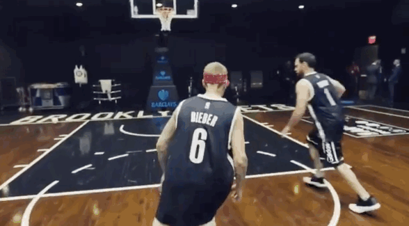 Justin Bieber responds to 'basketball playing trolls' by awkwardly raining  threes | For The Win