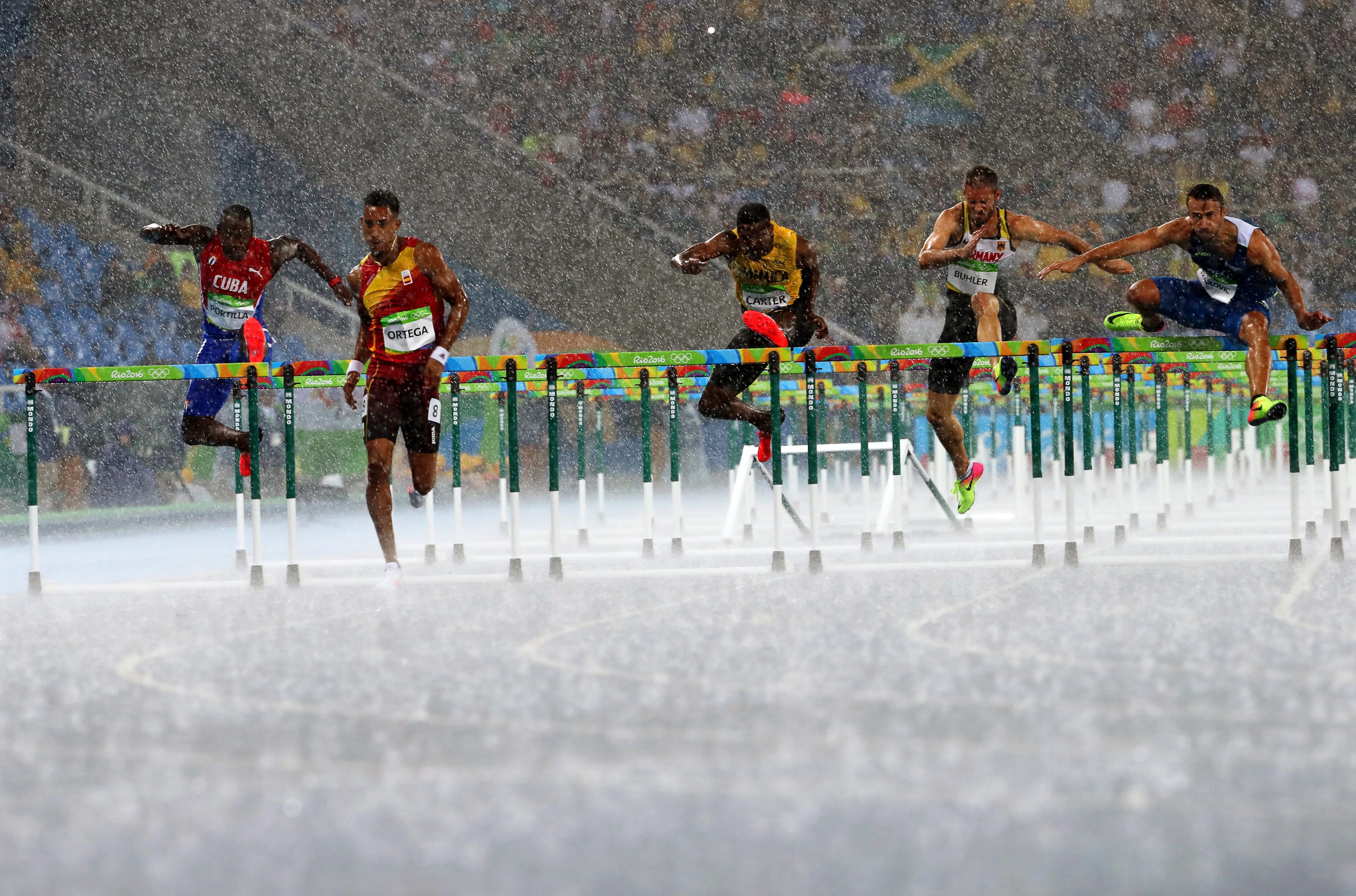 8 stunning photos from the rainsoaked track and field events at the