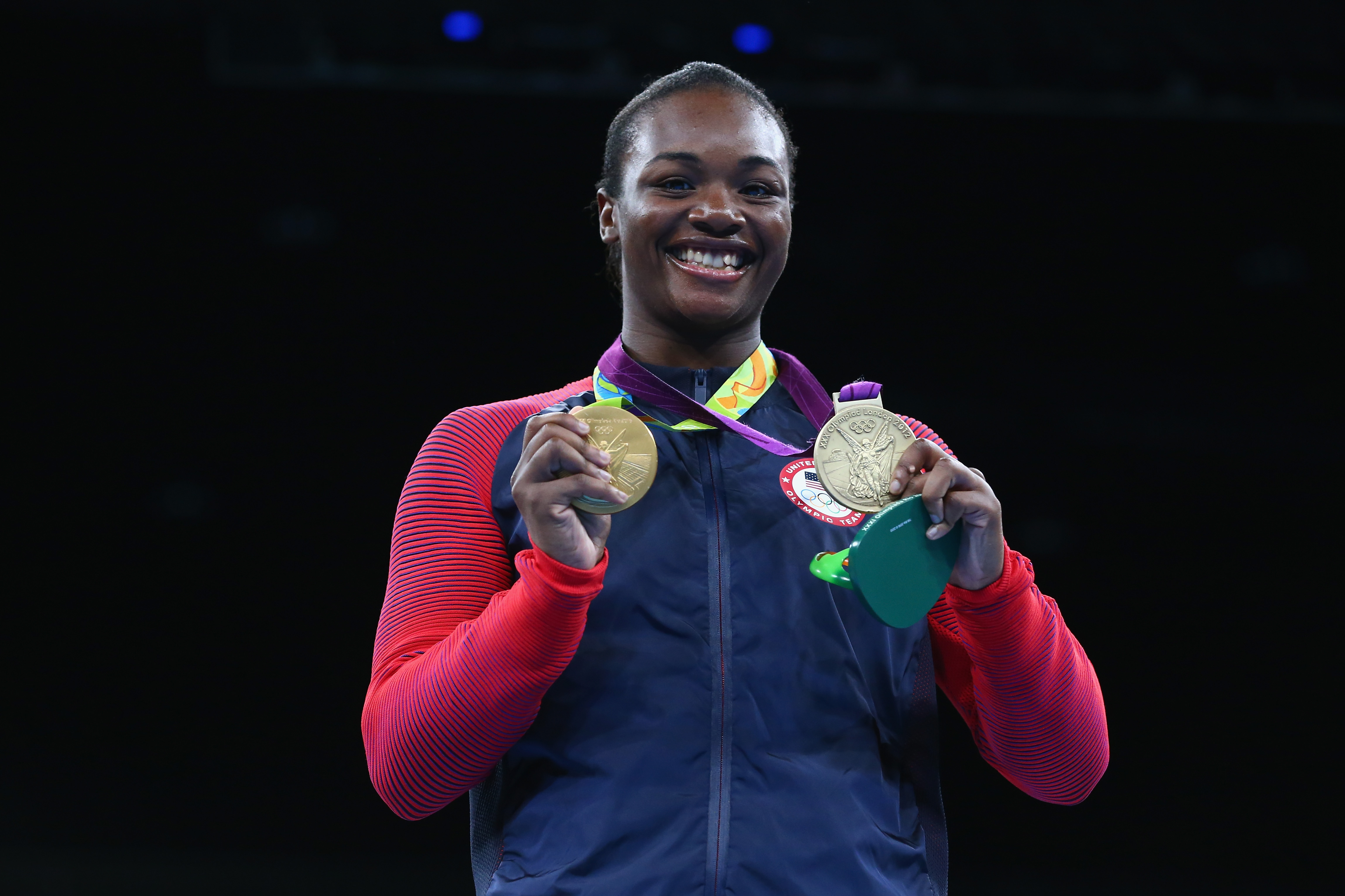 Claressa Shields snuck her 2012 gold medal onto the Rio medal stand