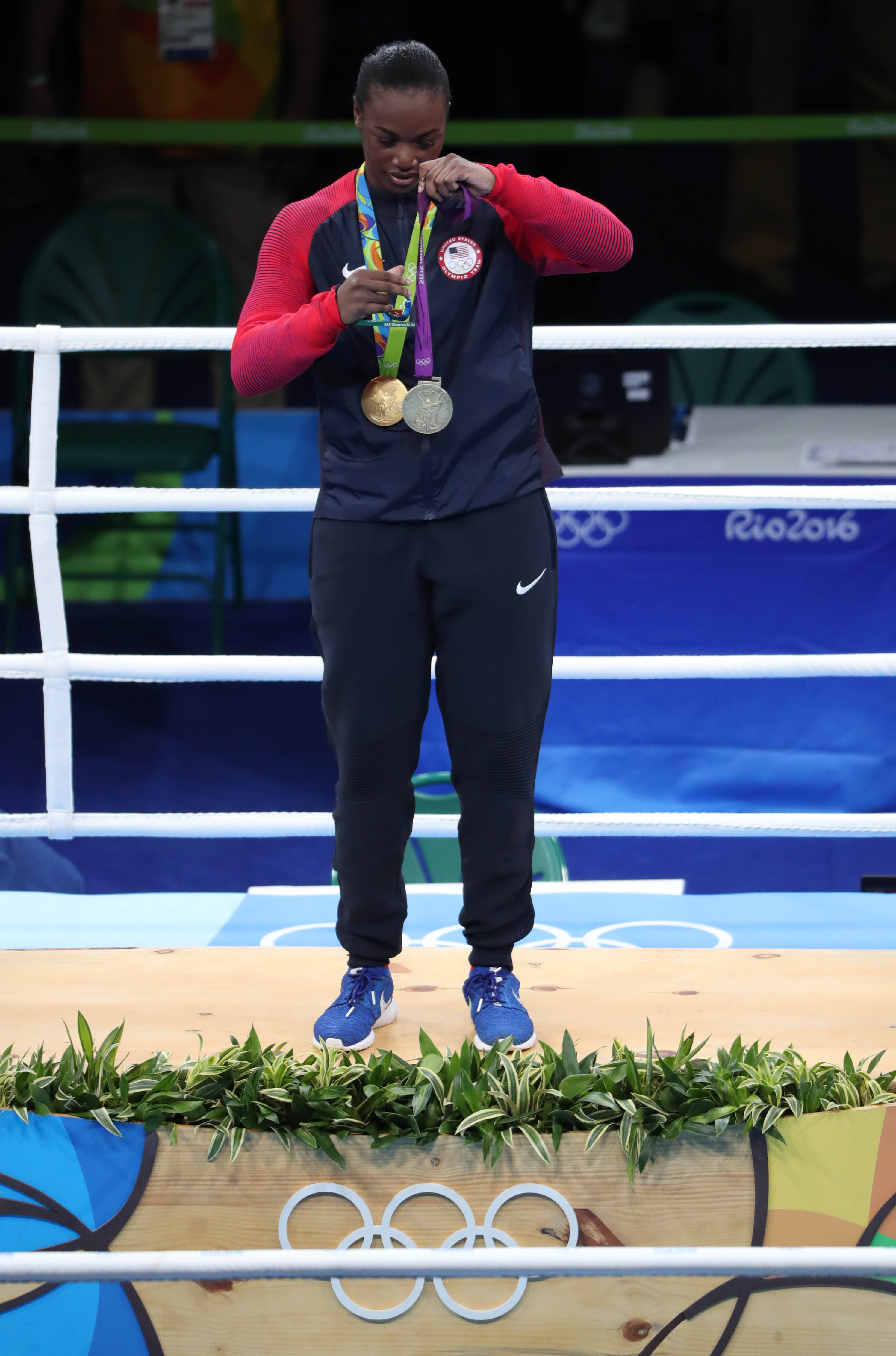 Claressa Shields snuck her 2012 gold medal onto the Rio medal stand