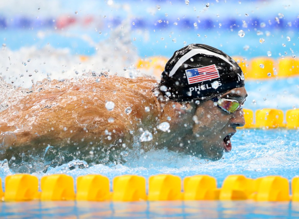8 incredible photos from Michael Phelps’ emotional final race For The Win
