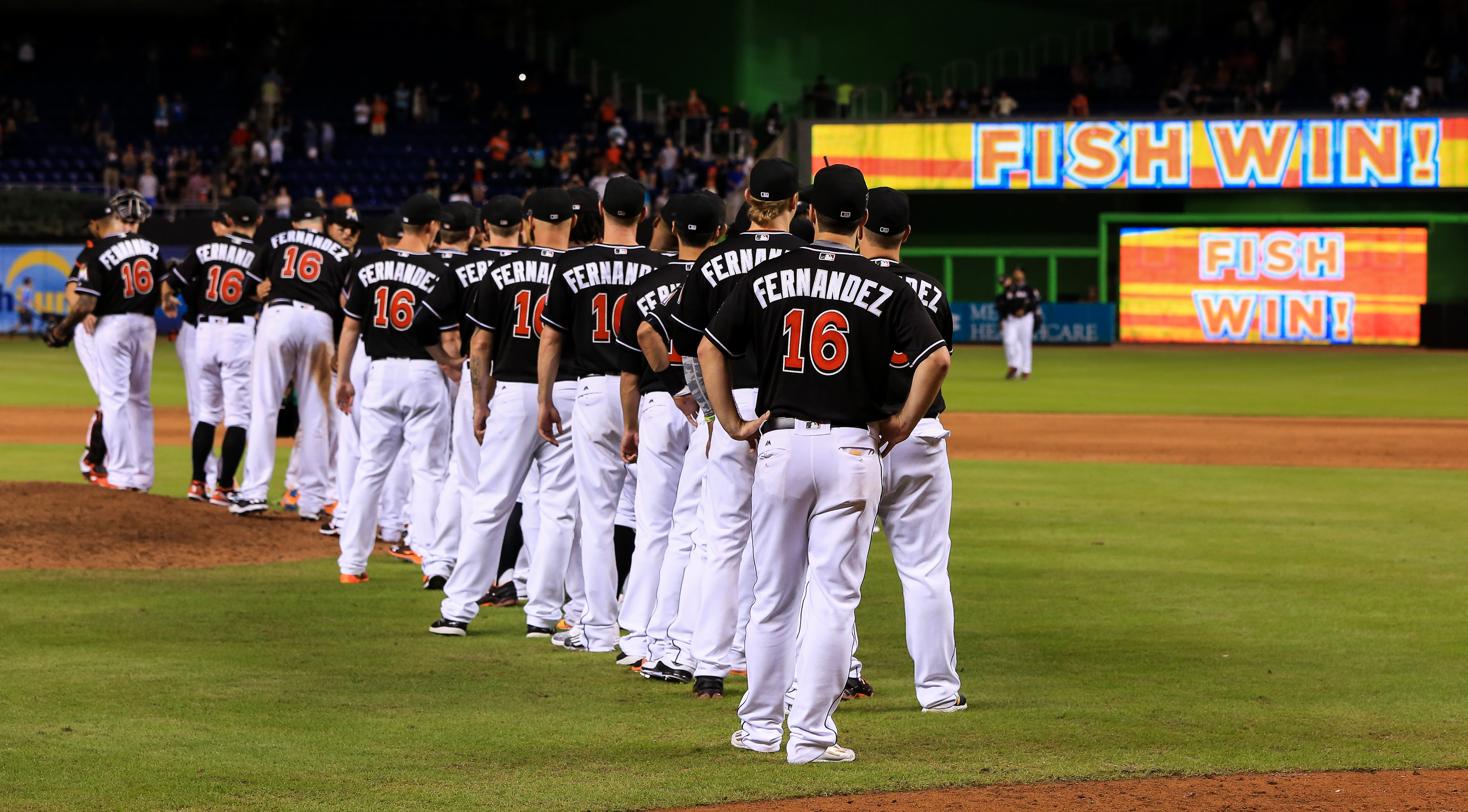MIAMI, FL - SEPTEMBER 26: Miami Marlins players shake hands after the game against the New York Mets at Marlins Park on September 26, 2016 in Miami, Florida. The entire Miami Marlins team wore Jose Fernandez jerseys in honor of the late pitcher. (Photo by Rob Foldy/Getty Images) ORG XMIT: 607685695 ORIG FILE ID: 610610484