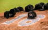 MIAMI, FL - SEPTEMBER 26: Miami Marlins leave their hats on the pitching mound to honor the late Jose Fernandez after the game against the New York Mets at Marlins Park on September 26, 2016 in Miami, Florida. (Photo by Rob Foldy/Getty Images) ORG XMIT: 607685695 ORIG FILE ID: 610610502