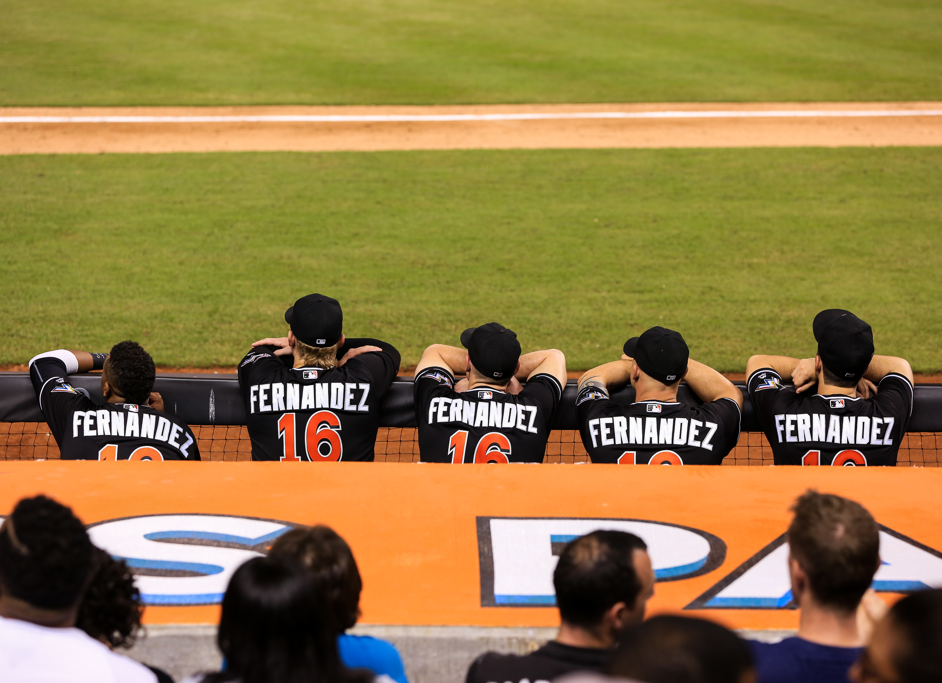 MIAMI, FL - SEPTEMBER 26: Miami Marlins players look on from the dugout wearing Jose Fernandez jerseys in honor of the late pitcher during the game against the New York Mets at Marlins Park on September 26, 2016 in Miami, Florida. (Photo by Rob Foldy/Getty Images) ORG XMIT: 607685695 ORIG FILE ID: 610610508